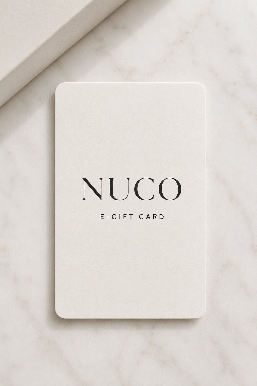 NUCO e-gift card on a marble surface